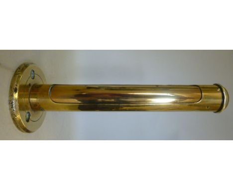 An early 20thC brass cased marine thermometer of pillar design with a rotating cover, the backplate incorporating three screw