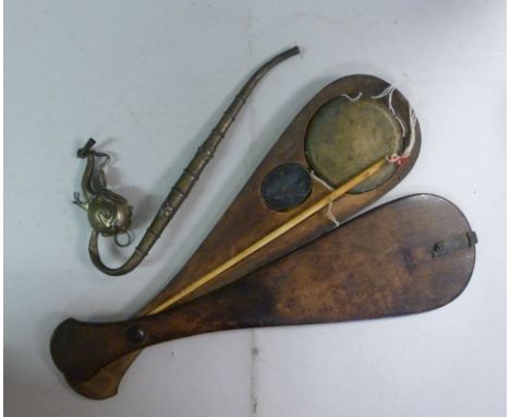 A late 19thC Indian silver coloured metal opium pipe, having a wire bound hook stem and an elephant's head bowl; and contempo