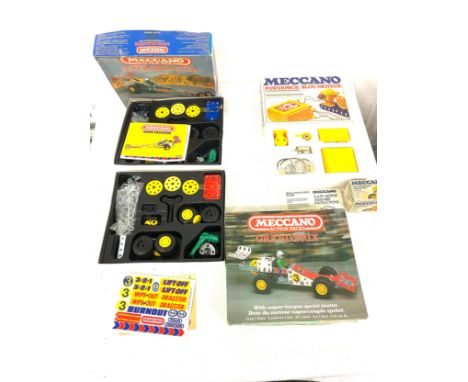 Selection of vintage Meccano to include Jnr powerdrive motor, Mecanno Bloc moteur, Mecanno Super Dragster, Mecanno Grand Prix