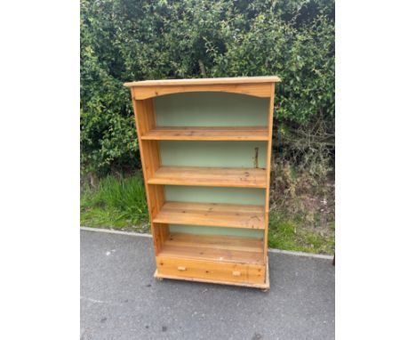 1 drawer 4 shelf oak bookcase measures approx 51.5" tall 30.5" wide 11.5" depth 