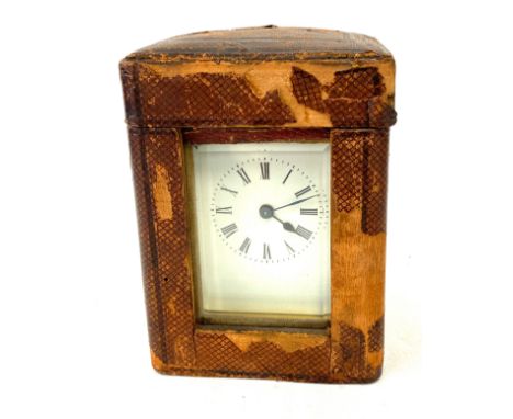 French carriage clock with original case, winds up and ticks, no warranty given 