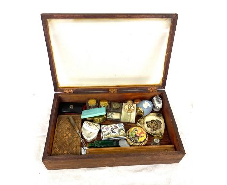 Showcase together with contents to include table lighter, ashtray, ink wells etc, case measures approximately Height 4.5 inch