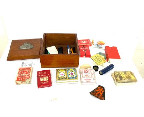 Wooden commemorative box with playing card contents 