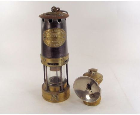 MINER'S LAMP ETC. A Thomas & Williams, Aberdare, Type No.1 miner's lamp & an American Auto-lite, by the Universal Lamp Co.