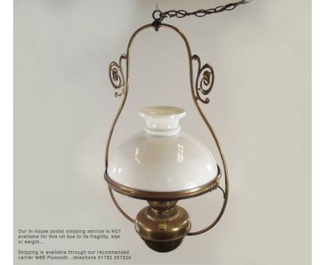 HANGING LAMP. A brass framed Veritas hanging oil lamp, converted to electricity. Height 72cm.