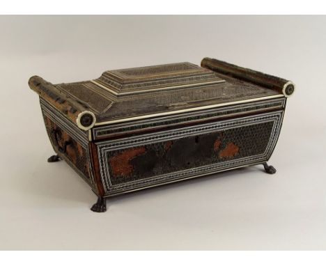 VIZAGAPATAM SEWING BOX.A late 18th/early 19th century Indian Vizagapatam sewing casket, with metal handles & lion's paw feet.