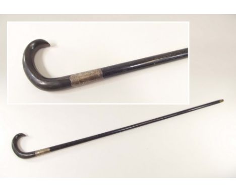 WALKING STICK. A silver mounted walking stick with horn handle.