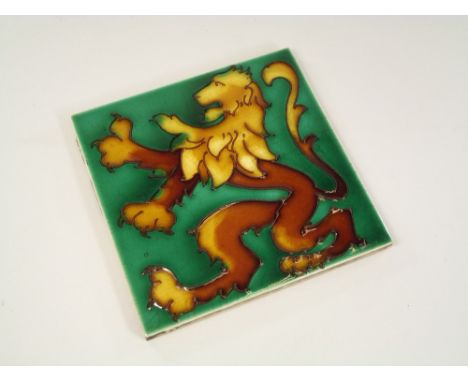 TILE. A T & R Boote tube-lined, lion rampant tile, possibly designed by Frederick Rhead.