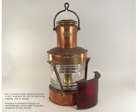 MAST HEAD LAMP. A copper & brass 'Anchor Lantern' with separate ruby glass screen. Patented by Telford, Brier & Mackay Ltd., 