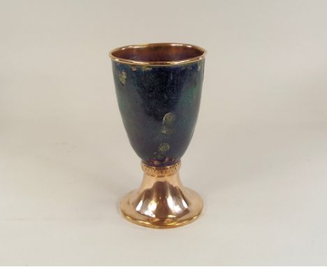 W.H. HASELER. An Arts & Crafts copper & blue enamelled chalice by W.H. Haseler. Stamped to the base, damaged enamel. Height 2