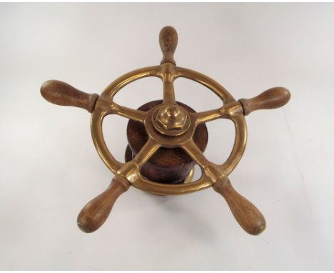 YACHT WHEEL. A bronze & oak yacht wheel. Diameter 34cm.