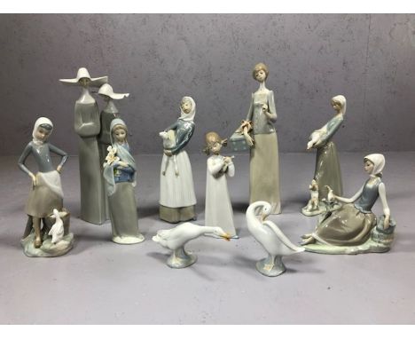 Collection of ten Lladro figurines to include pair of nuns, girl with lamb, two geese etc, the tallest approx 34cm in height,