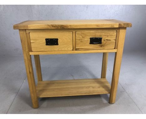 Modern light wood console table with two drawers and shelf under, approx 85cm x 35cm x 78cm tall