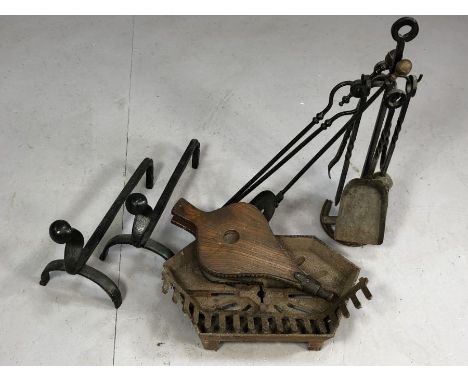 Collection of fire / fireside items to include small iron grate, pair of firedogs, fireside items on stand, bellows etc