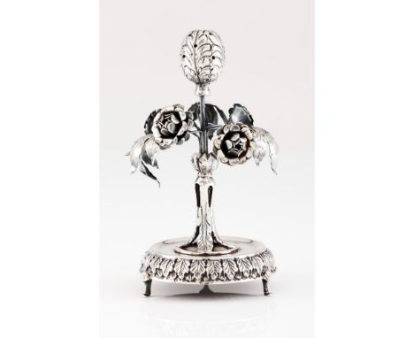 A toothpick holderSilverTree trunk with foliage and flowers surmounted by flower bulb resting on engraved circular stand of e