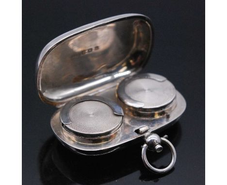 An Edwardian silver double sovereign case, of plain rounded rectangular form, maker William Hair Haseler, Birmingham, 1910.
