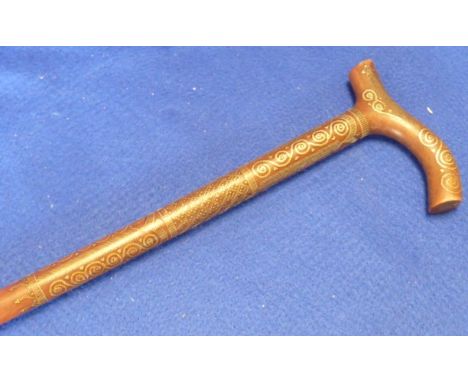 ADDED LOT    A late 19th/early 20th Century Eastern hardwood Walking Stick profusely inlaid to the handle and beginning of th