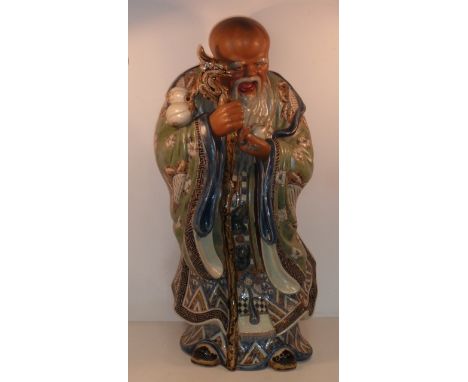 A large 20th Century hand decorated heavy ceramic Model of Shou Xing approx. 49cm high 