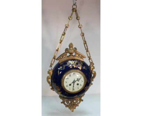 A good late 19th Century gilt metal mounted ceramic cased eight day hanging Wall Clock, the cream dial with Arabic numerals a