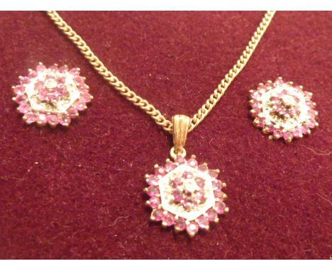 A 9 carat gold ruby and diamond cluster Necklace and Earrings 