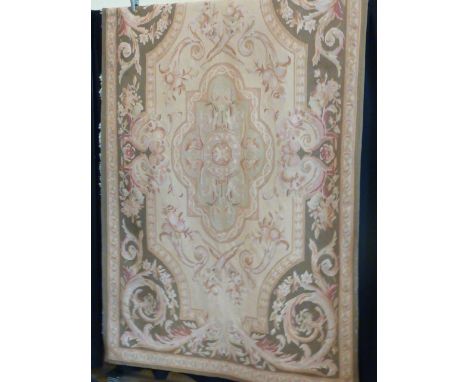 A French Aubusson style Tapestry, cream and green ground with foliate style designs etc., 250cm x 154cm 