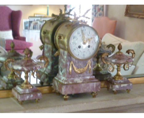 A good 19th Century French pink and white marble and ormolu mounted Clock Garniture, the white enamel dial with Roman numeral