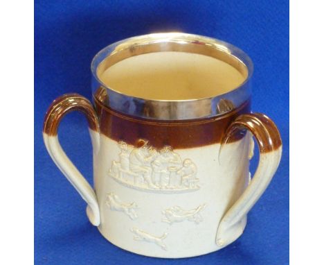 A late 19th Century stoneware Tyg having a silver plated rim typically decorated in relief with hunting and tavern scenes etc