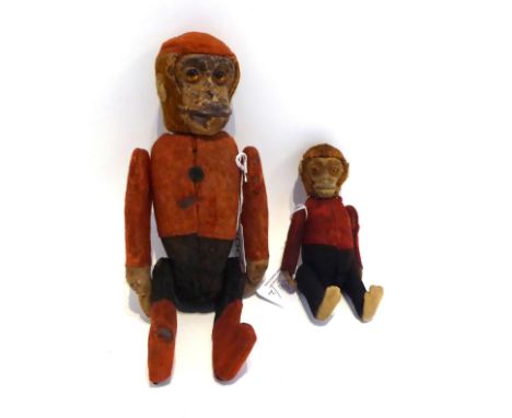 Early 20th Century Large Schuco Bellhop Monkey Flask, fully jointed with red and black felt uniform, glass eyes, 21cm, and An