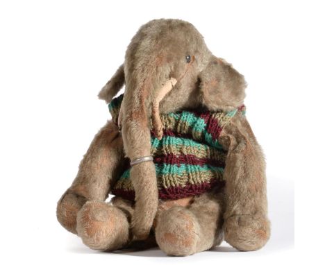 An Early 20th Century Mohair Steiff Elephant, with jointed arms and legs, bearing a plain button for 1904/5, boot button eyes