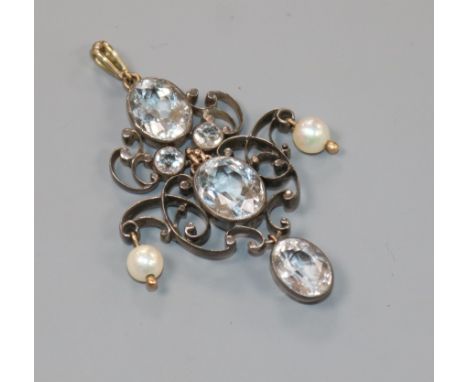 A late Victorian yellow and white metal, pale aquamarine and pearl set lozenge shaped drop pendant, overall 57mm.