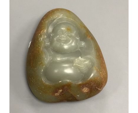 A jade boulder carving of a Buddha