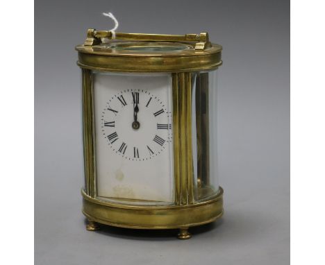 An oval four glass carriage clock