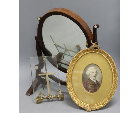 A portrait miniature easel frame and a toilet mirror