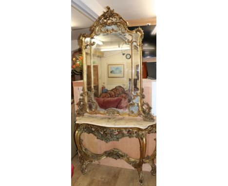 A Louis XV style carved giltwood marble console table, with mirror over W.135cm