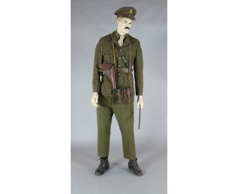 A WWI Royal Field Artillery officer's dress uniform and accessories, on a mannequin, of the type worn by 2nd Lieutenant Richa