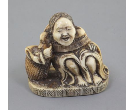 A Japanese ivory netsuke of Shojo, Meiji period, signed Ryumin, seated, resting on a barrel, h. 3.3cm