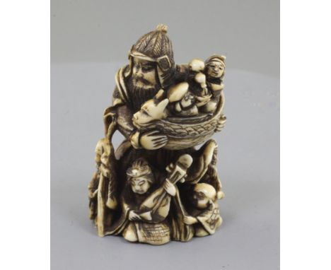 A Japanese ivory netsuke of Bishamon Ten, Meiji period, standing and holding a miniature of the Gods of Good fortune, unsigne