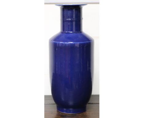 A Chinese monochrome deep blue vase, with Kangxi mark height 41cm