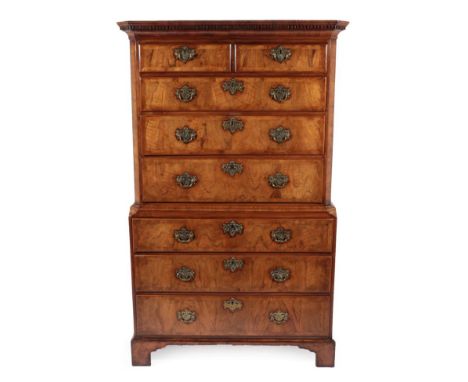 A Walnut and Crossbanded Chest on Chest, circa 1740, the dentil cornice above two short and three long graduated drawers with