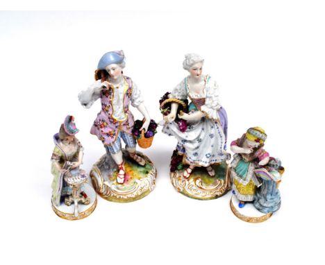  ~ A Meissen Porcelain Figure of a Girl, circa 1900, in 18th century costume playing cards on a tripod table, on a scroll mou