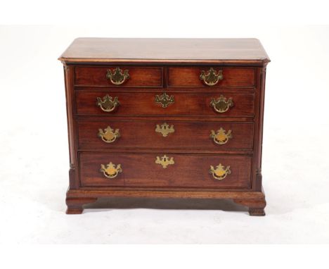 A George III Mahogany and Crossbanded Straight Front Chest of Drawers, circa 1780, the moulded top above two short and three 
