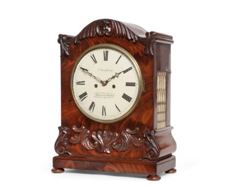 ~ A Mahogany Striking Table Clock, signed T.Humphreys, Barnard Castle, circa 1840, arched pediment, carved mounts to the fron