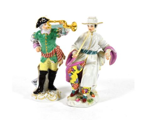A Meissen Porcelain Figure of a Huntsman, 20th century, standing wearing a green jacket playing a horn, on a scroll moulded b