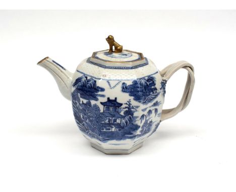  ~ A Chinese Porcelain Teapot and Cover, Qianlong, of hexagonal baluster form with gilt dog knop and entwined handles, painte