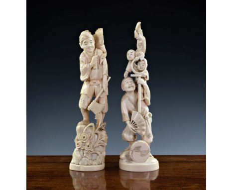 Two Japanese carved ivory okimonos, Meiji period (1868-1912), the first modelled as a standing man with a fan and holding a h