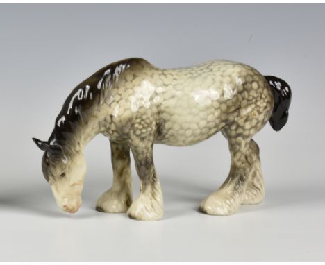 A Beswick Rocking Horse grey grazing Shire Horse, printed factory mark to belly, 5in. (12.7cm.) high.