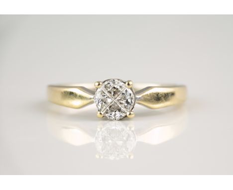 An 18ct gold and diamond four stone ring, the four trillion cut diamonds in a circular illusion setting, over arrow shoulders