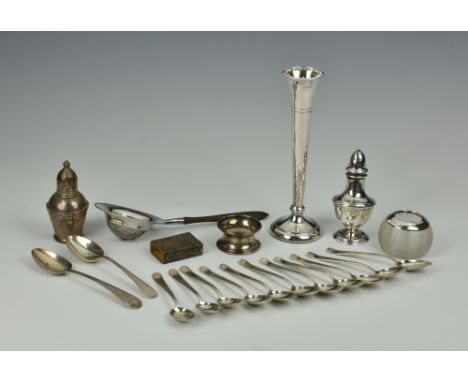 A collection of silver smalls, comprising of a tea strainer with wooden turned handle by Gorham Manufacturing Co, Birmingham,