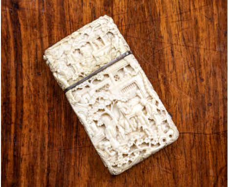 A Chinese Canton carved ivory card case, 19th century, carved with figures, birds and pagodas amidst trees and flowering shru