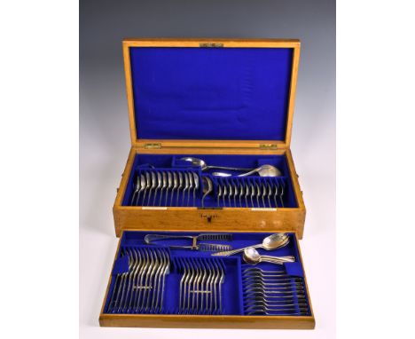 A Victorian oak cased canteen of Hanoverian rat tail pattern cutlery, Goldsmiths &amp; Silversmiths Company (William Gibson &